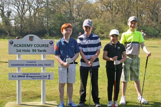 Connor Babbington, Sam Vowles, Abbey Dymott and Jacob Newland by the first tee of Lee's new academy course