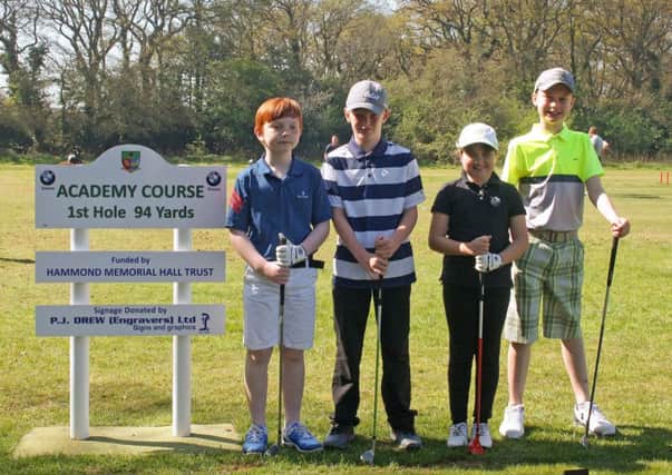 Connor Babbington, Sam Vowles, Abbey Dymott and Jacob Newland by the first tee of Lee's new academy course