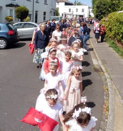 Rainbows and Brownies dressed as princesses for their May fair in Alverstoke