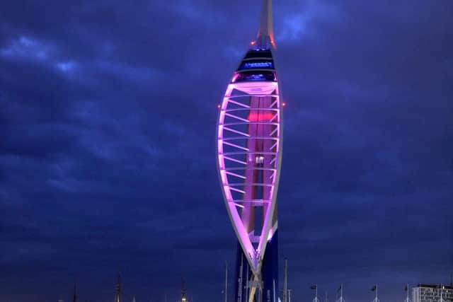 The Spinnaker Tower lit up purple