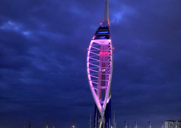 The Spinnaker Tower lit up purple