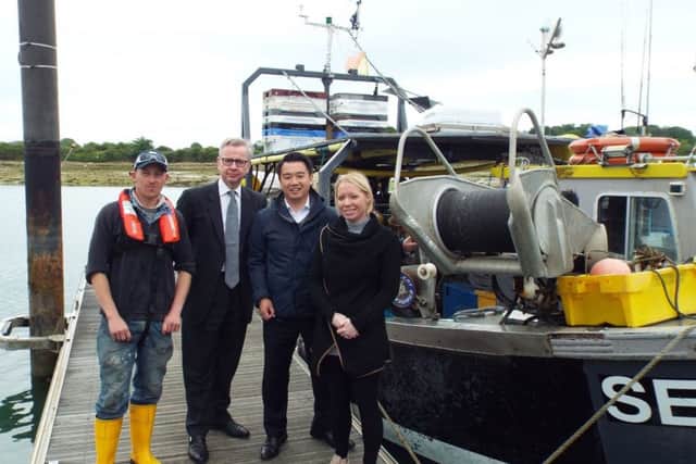 Havant MP candidate Alan Mak alongside former Education Secretary Michael Gove and owners of Fresh From The Boat Peter and Chantelle Williams PPP-170515-163528001