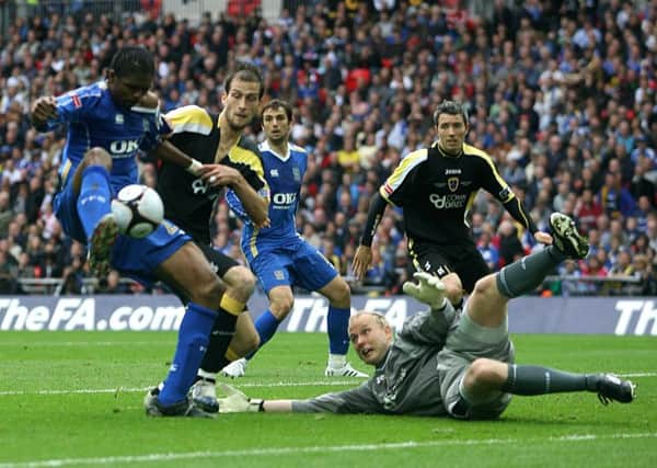 Kanu scored the only goal of the game as Pompey defeated Cardiff 1-0 in the final at Wembley