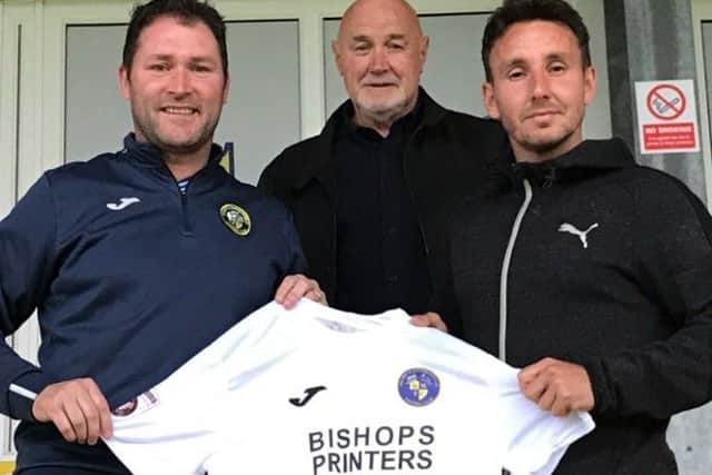 Matt Tubbs, right, is welcomed to the Hawks by manager Lee Bradbury and chairman Derek Pope