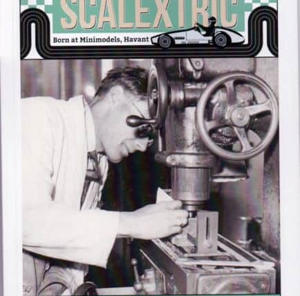 The cover of the 70-page Scalextric booklet.