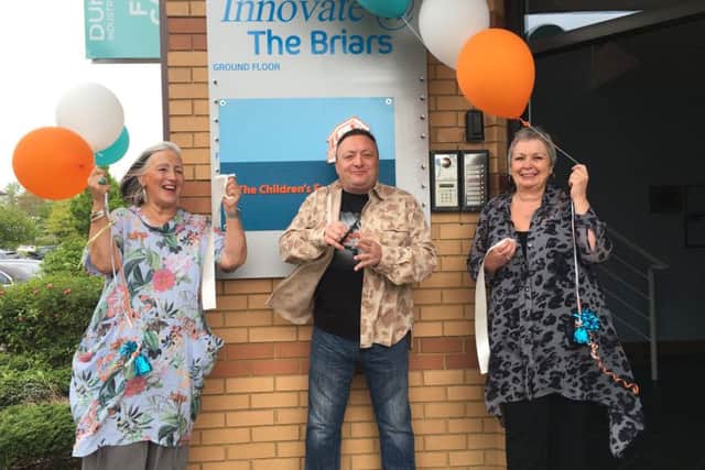 From left Marina Mulholland, chief executive of The Children's Family Trust, Steve Power from radio station Wave 105, and Karen Blackman, manager of The Children's Family Trust, at the unveiling of the foster charity's new office in Waterlooville. Picture: Tamara Siddiqui