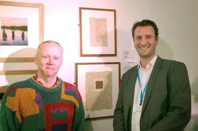 Open exhibition winner Adrian Mundy with The Springs Jon Woodley. The work is part of the May Days Arts Trail