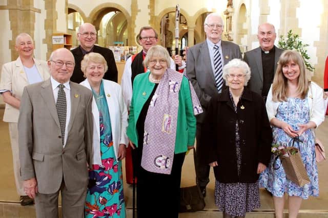 Bishop Christopher Foster, centre, with, recipients of the St Thomas Award. From back left, Rose Ashton, John Green, Bishop Christopher, Alan Hoad, the Rev Michael Harper. Front, Brian and Beulah Walters, Canon Marion Syms, Bunty Alderton and Jenny Tait.