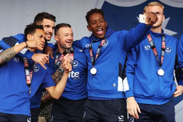 Kyle Bennett,  Gareth Evans,  Noel Hunt and Jamal Lowe at Pompey's title-winning celebrations. Picture: Joe Pepler