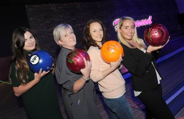Pictured at Hollywood Bowl, Gunwharf Quays, are, from left: Amy Pickance (24) from Southsea, Nikki Jones (35) from Hilsea, Jay Powell (38) from Romsey and Rebekah Reynolds (28) from North End.

Picture: Sarah Standing (170660-2198)