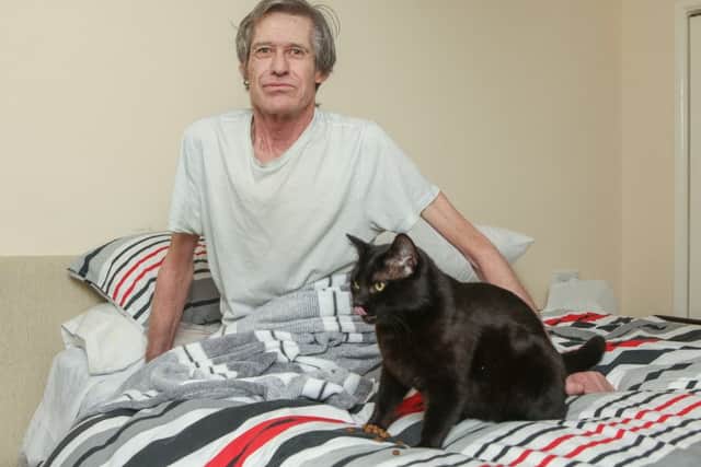 Jack Lovelock, 58, back at home reunited with Charlie the Cat.Picture: Habibur Rahman (170646-23)