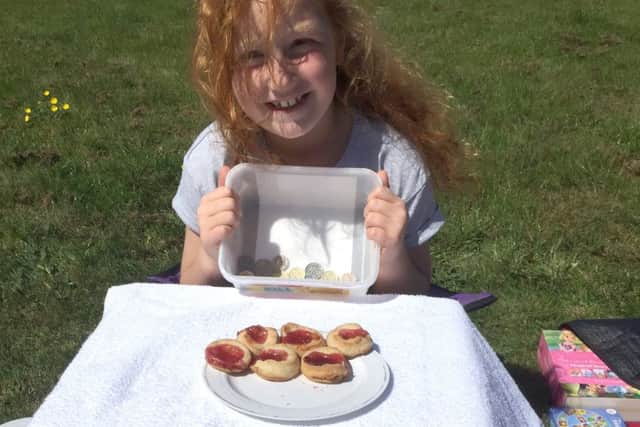 Chloe Pollard made jam tarts to sell to put towards money for Emma Burton's damaged beach hut