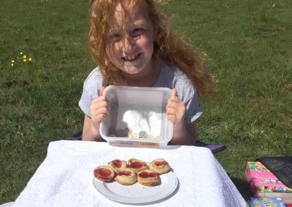 Chloe Pollard made jam tarts to sell to put towards money for Emma Burton's damaged beach hut
