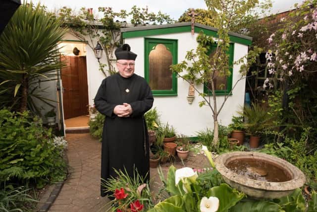 Father Julian Kent from Portsmouth outside the cathedral.
Picture: Cuprinol