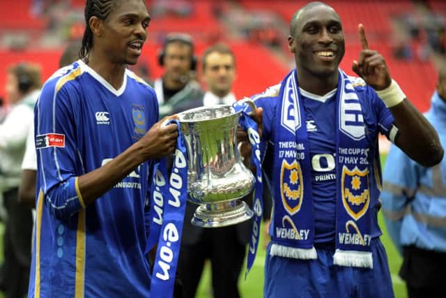 Nwankwo Kanu and Sol Campbell with the FA Cup. Pciture: Steve Reid