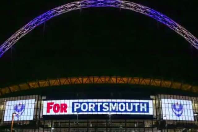 Pompey's colours shown on the Wembley arch. Picture: Wembley Satdium Twitter account