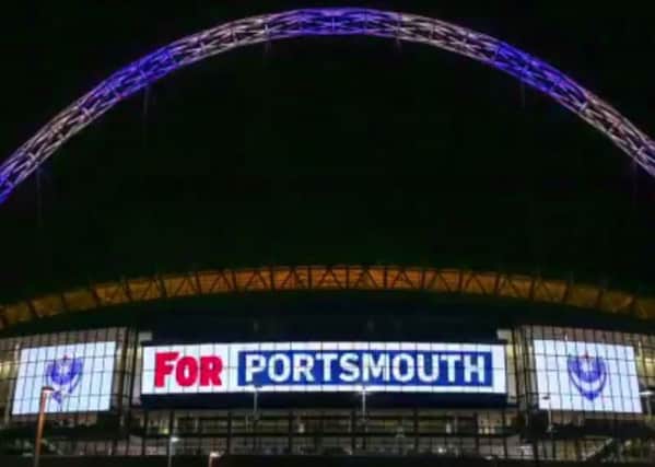 Pompey's colours shown on the Wembley arch. Picture: Wembley Satdium Twitter account