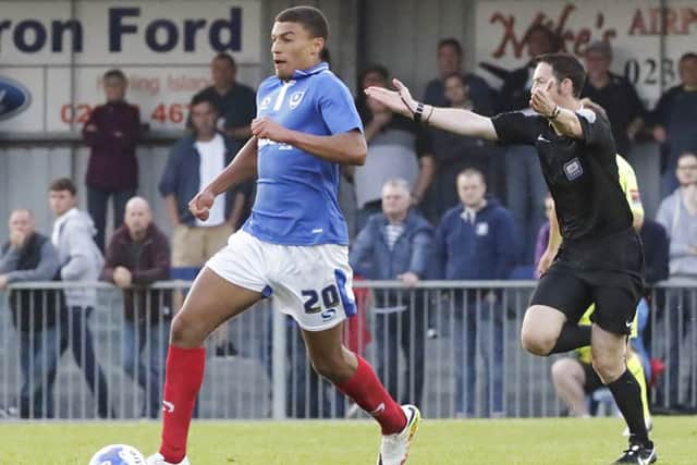 Christian Oxlade-Chamberlain in actions against the Hawks. Picture: Barry Zee