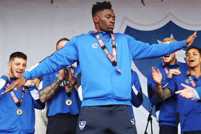 Amine Linganzi on the stage on Southsea Common as Pompey celebrate their League Two title success Picture: Joe Pepler