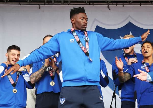 Amine Linganzi on the stage on Southsea Common as Pompey celebrate their League Two title success Picture: Joe Pepler
