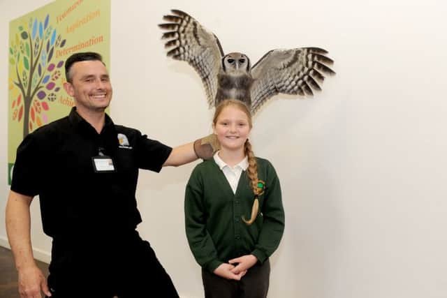 Jason Ashcroft from Falconry UK with Amber Brown and Liberty the Verreaux Milky Eagle Owl. Picture: Sarah Standing (170661-2239) PPP-170519-155812001