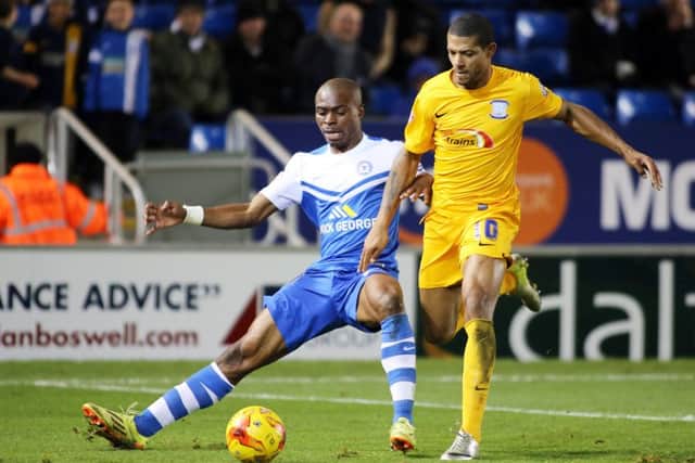 Jermain Beckford, right, has signed for Bury