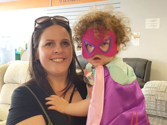 Fancy dress winner Scarlett Pickett, with mum Jodi,