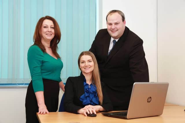 Joanne Sullivan, left, and Victoria Girsa of GBS UK Immigration, a specialist in UK immigration law, with Pete Outen, the centre manager at Portsmouth Technopole