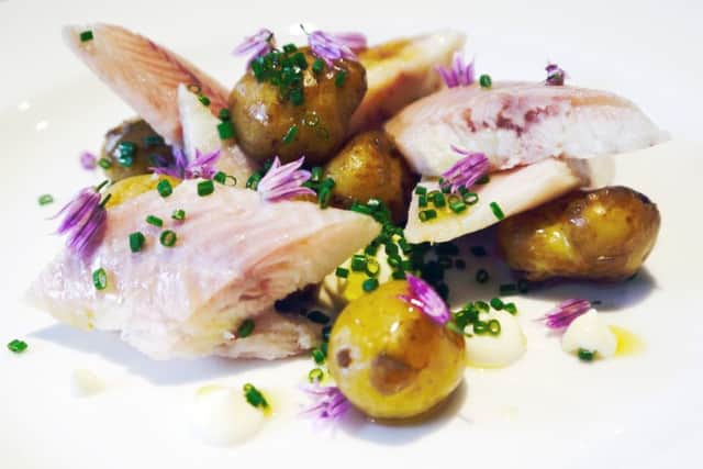 This floral dish enhances the rich and delicate taste of smoked eel