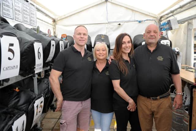 Neil Matthews, landlord of the Delme Arms, at last 2016's festival with wife Angie, sister-in-law Lorraine Young, and Kev Sims.