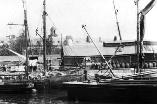 Its the early years of the last century and we are looking into South Camber, Old Portsmouth, when all the vessels were driven by sail. 				                        Picture: Barry Cox Collection