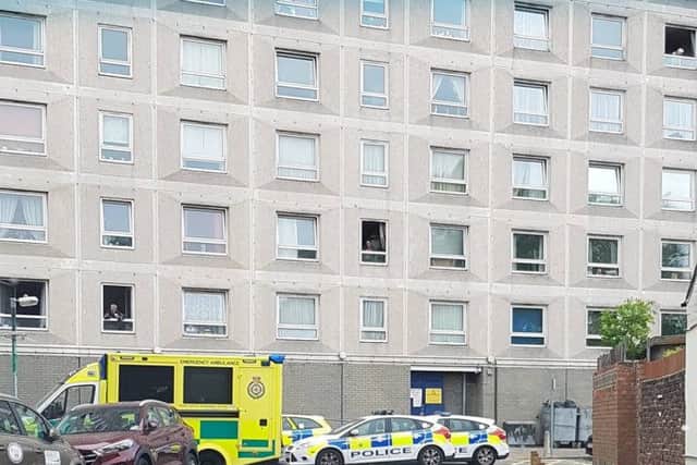 Police cars and an ambulance at Edgbaton House in Somers Town after a man died