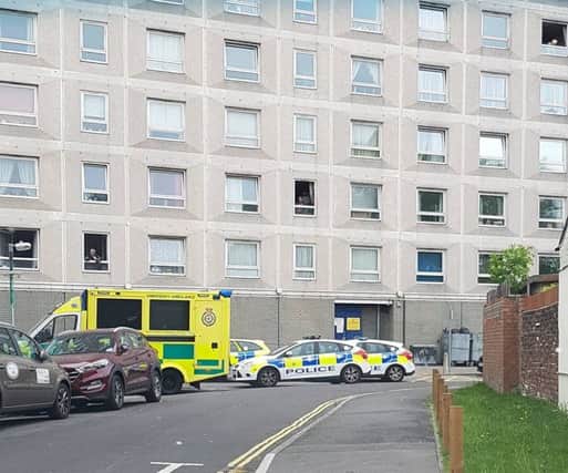 Police cars and an ambulance at Edgbaton House in Somers Town after a man died