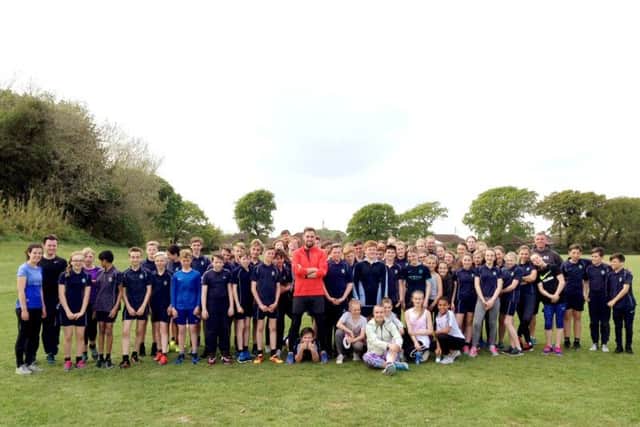 Marathon runner Ben Smith with pupils from Crofton School,