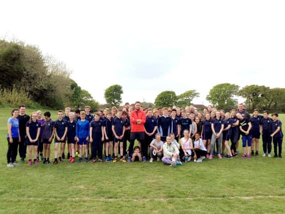 Marathon runner Ben Smith with pupils from Crofton School,