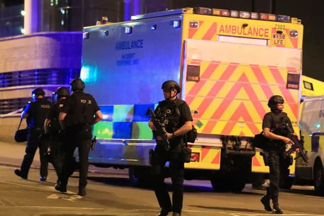 Armed police at Manchester Arena after the explosion at the venue during an Ariana Grande gig. Picture: Peter Byrne/PA