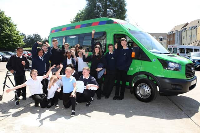 Pupils with the new minibus Picture:Habibur Rahman