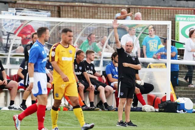 Paul Cook during the friendly with Sutton last season. Picture: Joe Pepler