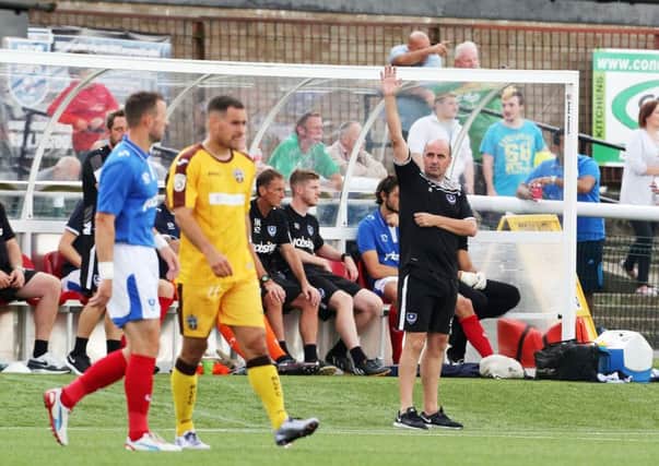 Paul Cook during the friendly with Sutton last season. Picture: Joe Pepler