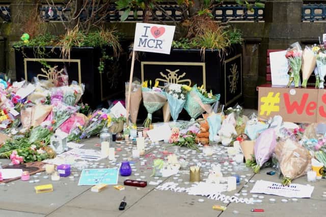 Floral tributes left by Manchester Town Hall