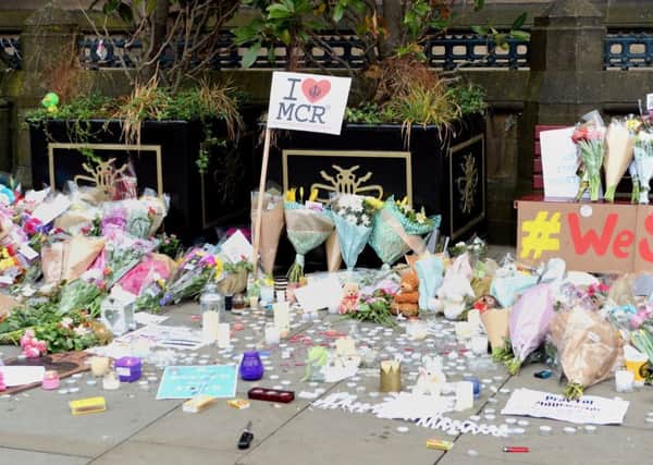 Floral tributes left by Manchester Town Hall