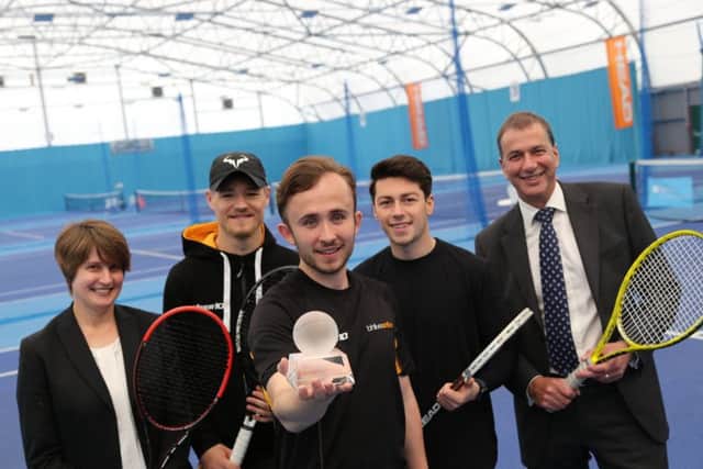 John Taylor, front holding the trophy, with Jo Dallas Portsmouth Tennis Centre manager, Dan Jolliffe, Macca Neaves and Peter Gunn BH Lives chief executive.