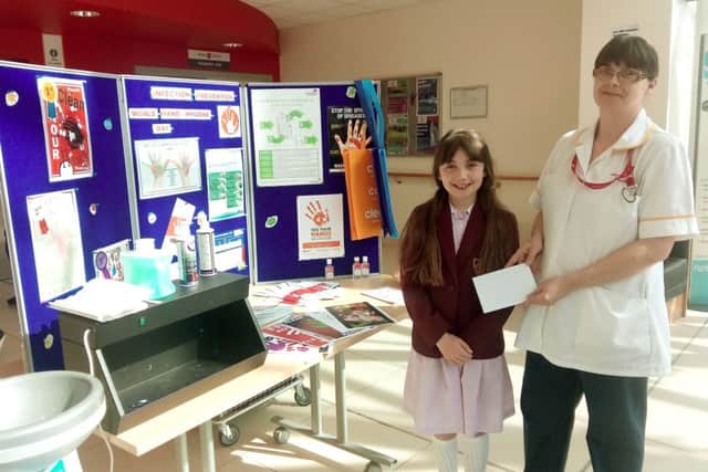 Jessica Mansbridge, nine, a Portsmouth High School pupil, came in third for the Clean Your Hands competition.