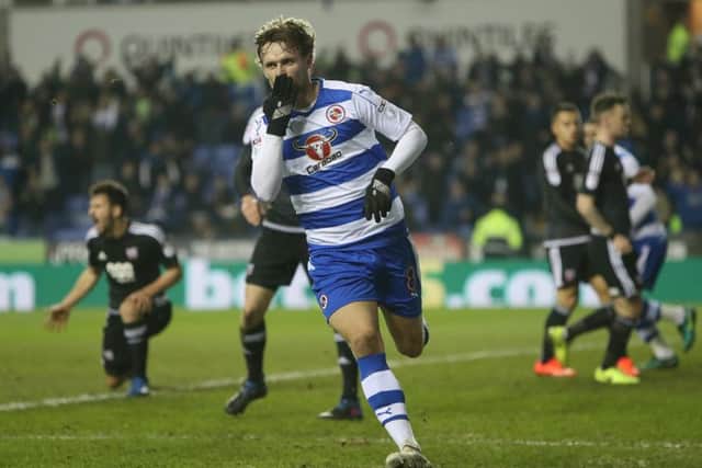 John Swift celebrates a goal for Reading