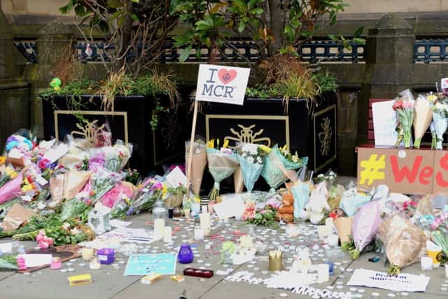 Floral tributes left outside Manchester Town Hall