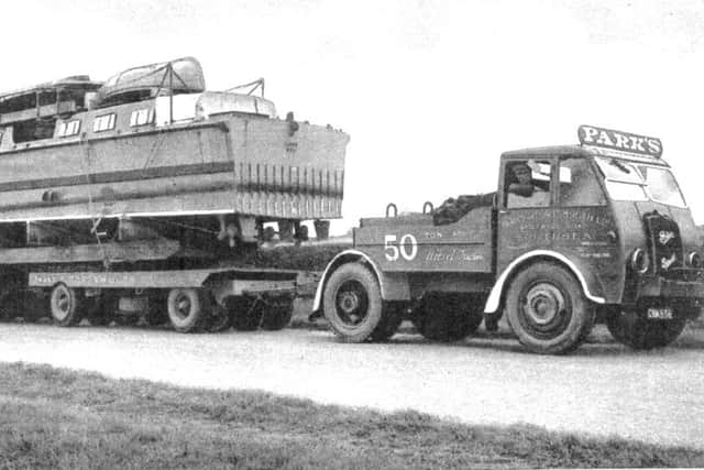 The original picture of a 48ft Fast Launch on the Park's low-loader.