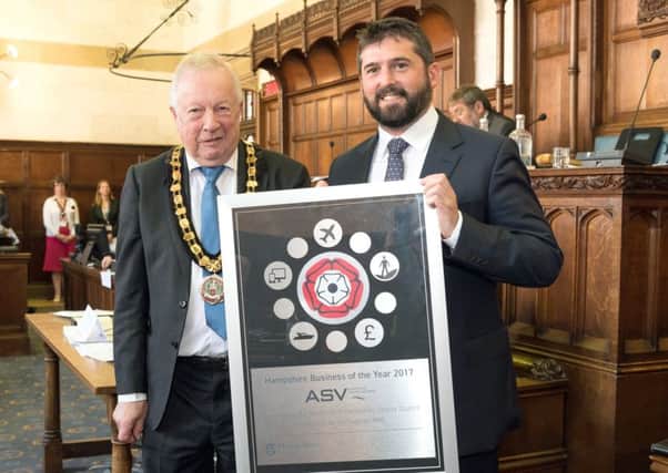 Managing Director Dan Hook receiving the award at the Councils AGM in Winchester presented by the council Chairman Councillor Keith Chapman.