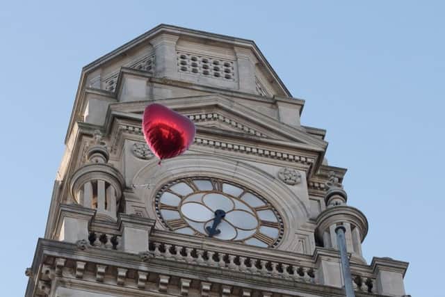 A balloon is released at the Guildhall during a vigil for the victims of the Manchester bombing in Guildhall Square, Portsmouth
