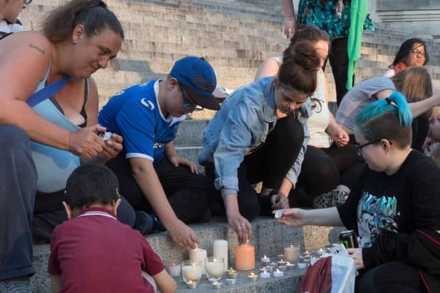Candles were lit at the vigil