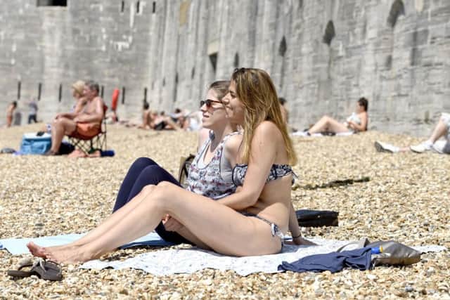 People enjoying the sun and hot weather at Southsea Beach in July last year. 

Picture: Solent News & Photo Agency
UK